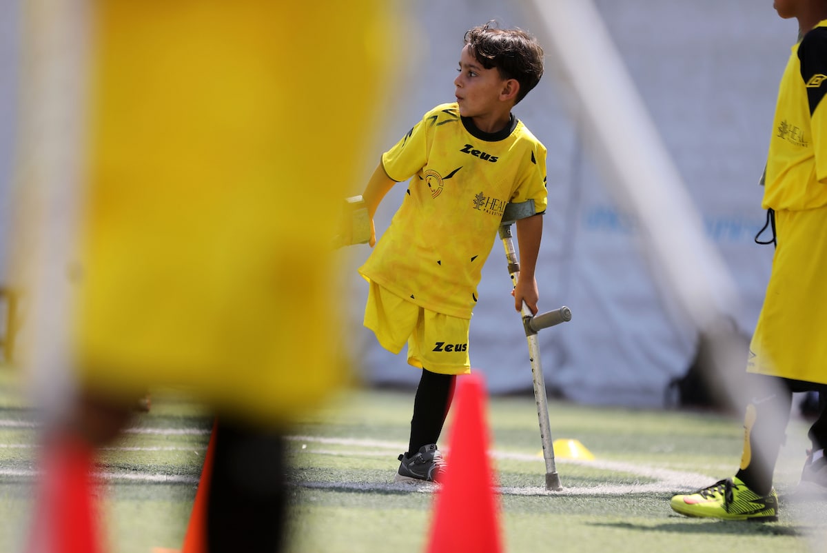 Palestinian amputee children take part in football training in Gaza City